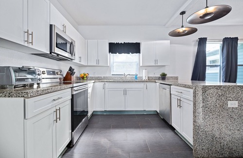 Tampa Heights House | Trendy 7 Bedroom Home | Private Heated Pool