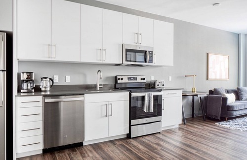 St. Elizabeth's Apartment | Trendy Brighton 1BR w/W/D, Gym, near T, Shops + Dining, by Blueground