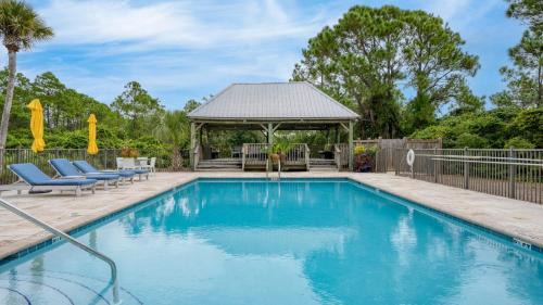 Seagrove Beach House | Triton Balcony w Pool View Chic Design