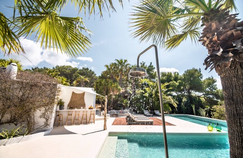 Sant Antoni de Portmany Villa | tropical luxury villa, 6 bedrooms ensuite + service room, sea/sunset views