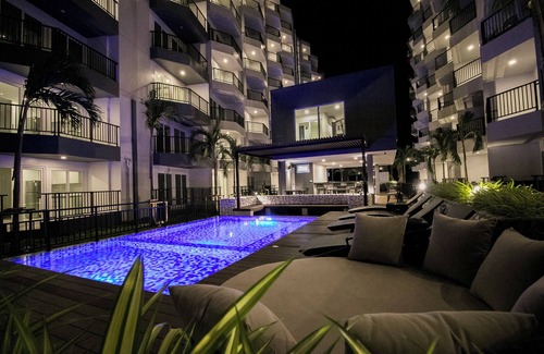 Kram Condo | Tropical beach nearby, Studio well-equiped kichen, AC, Wi-fi, Pools and Gym