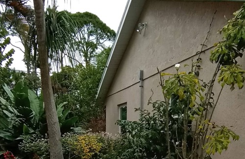 Englewood South Cottage | Tropical Garden Cottage only 3 miles to beautiful Englewood Beach. Pet-friendly!