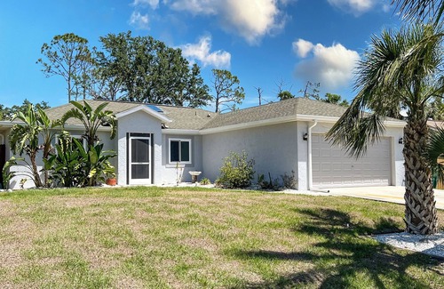 Port Charlotte House | Tropical Home With Waterfall, HotTub, Fenced Yard, Beachy Lounge Area & Pets!