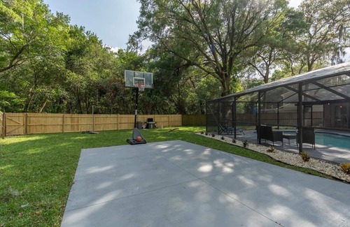 Temple Terrace House | Tropical Luxury Escape with Backyard Oasis & Pool