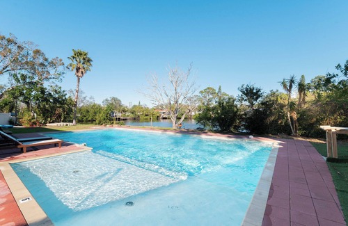 Kenneth City House | Tropical oceanfront Oasis, 2 BR with Saltwater pool in Florida