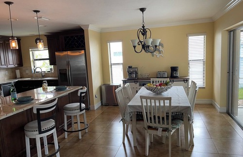 Caloosahatchee House | Tropical Poolside Escape in Cape Coral