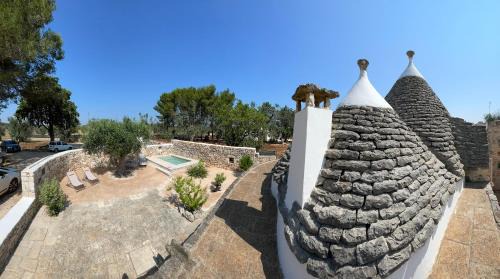 Latiano House | Trullo con piscina baby
