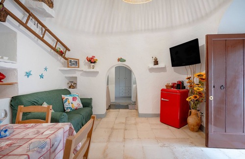 Fasano House | Trullo 'Negli Ulivi' with Private Terrace, Wi-Fi and Air Conditioning