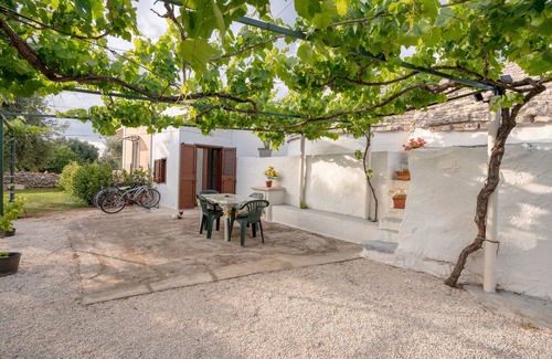 Fasano House | Trullo 'Negli Ulivi' with Private Terrace, Wi-Fi and Air Conditioning