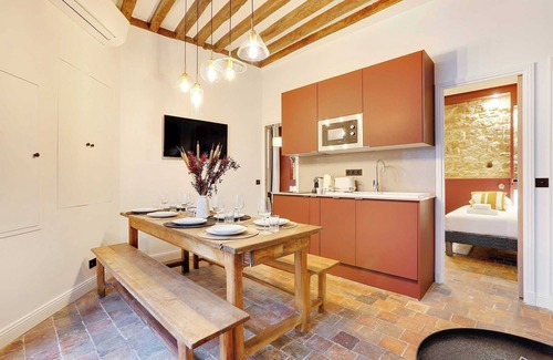 Quartier Sainte-Avoye Apartment | Truly Marais !Set in a passage flowered setting with beautiful colored windows.