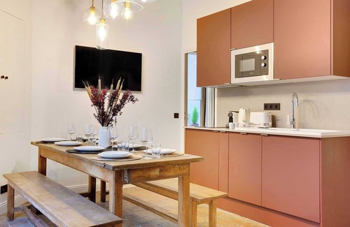 Quartier Sainte-Avoye Apartment | Truly Marais !Set in a passage flowered setting with beautiful colored windows.