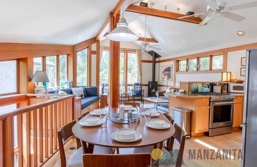 Manzanita House | Tucked into the hillside a block up from the beach. Dog Friendly and oh so cute!