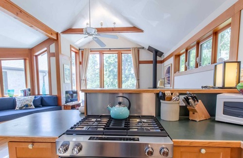 Manzanita House | Tucked into the hillside a block up from the beach. Dog Friendly and oh so cute!