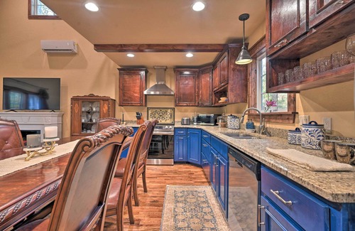 Broken Bow Cottage | Tudor-Style Broken Bow Cottage w/Hot Tub & Decks!