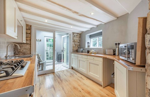 Winchcombe Cottage | Two bed dog friendly Cotswold stone holiday cottage in Winchcombe - Miller's Cottage