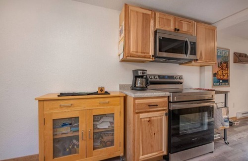 Rhinelander Cabin | Two bedroom calming cabin resting amongst turn of the century oak and pine.