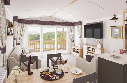 Aberystwyth House | Two bedroom caravan, sleeping four people, perfect for relaxing by the coast.