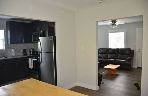 Northside House | Two bedroom, one bath, modern bungalow with full kitchen and outdoor dining.