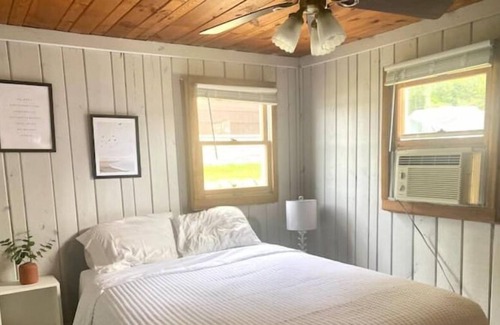 Sister Lakes Cottage | Two Contemporary Cottages on Sandy beachfront Lake, lux Boat available!