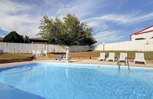 Decatur Hotel | Two Convenient Room Located at I-28 | Outdoor Pool & Free Parking