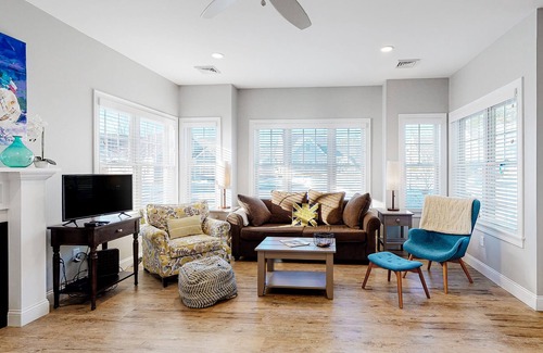 Arundel Condo | Two stroy condo with heated pool, gym, private patio, gas fireplace, W/D, AC