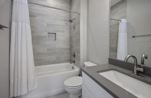 West End House | Two Townhomes- Rooftop Lounges- Hot Tub- Game Room