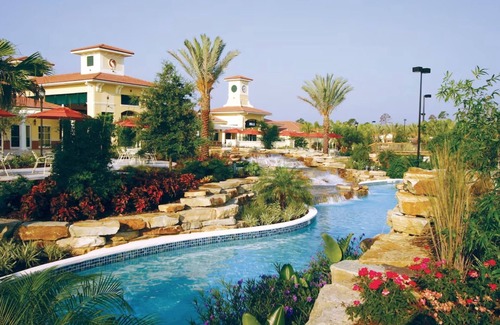 Orange Lake Villa | Ultimate Family & Business Getaway: Spacious 2BR villa, pool, golf, & much more.