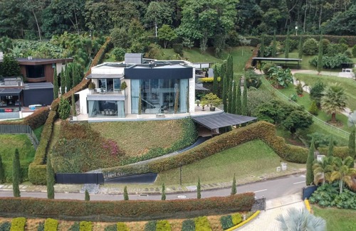 Medellin House | Ultra-Luxury Mansion In Medellin Gym Jacuzzi Daily Maid Barbershop Gameroom Bar