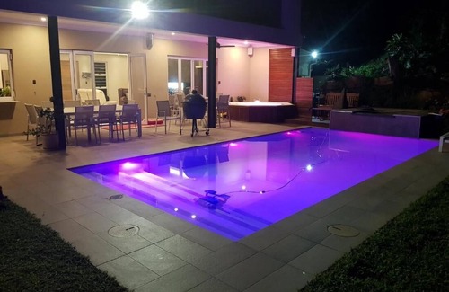 La Lucia House | Umhlanga Lodge Room leads of a shared kitchenette and dining room
