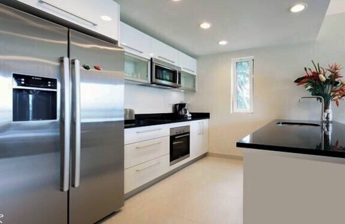 Simpson Bay Condo | UNBRIDLED Le Papillon: Beachfront Elegance with Backup Generator