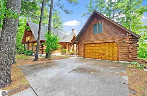 Suttons Bay Cabin | Unforgettable Log Cabin Experience: Family-owned, Lakefront, Private Beach