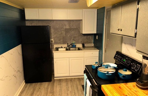 Moorhead Apartment | Unique Discreet Hidden Entrance. Sleep in with 2pm checkout!