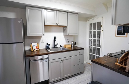 Rosemont House | Unique duplex that has 2 family rooms and 2 kitchens