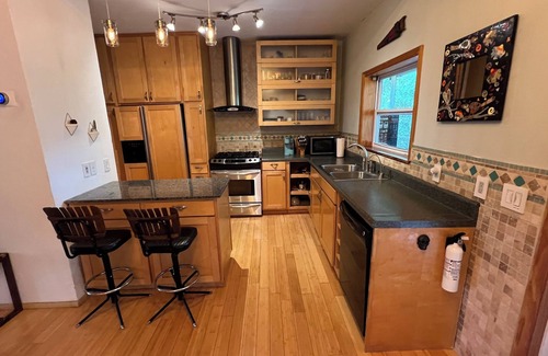 New Smyrna Beach House | Unique Furnished Tropical Lodge in New Smyrna Beach