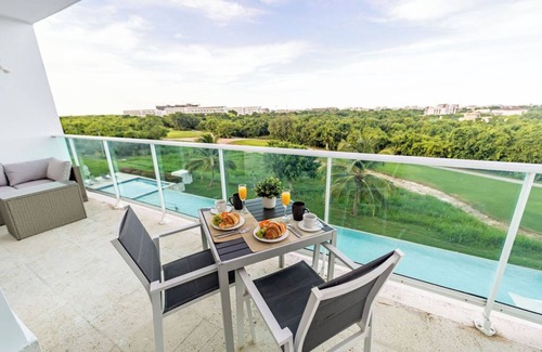 Bavaro Apartment | Unique Golf & Pool view 2 BDR Condo @ Cana Rock