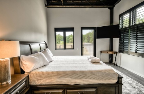 Bumpass House | Unique lake house with infinity pool, hot tub, modern interior, & views