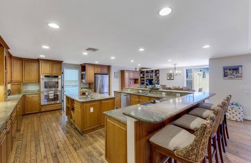 Naples House | Unique Moorings home with personal gym, newly remodeled pool, 4 ensuite bedrooms