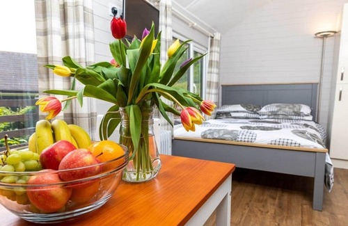Berrynarbor Cabin | Unique, peaceful, cosy and quaint cedar wood built holiday lodge.