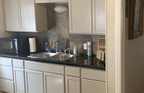 San Saba Apartment | Unit 206, a 1946 historic Triplex bungalow style apartment of approx. 800 sq ft.