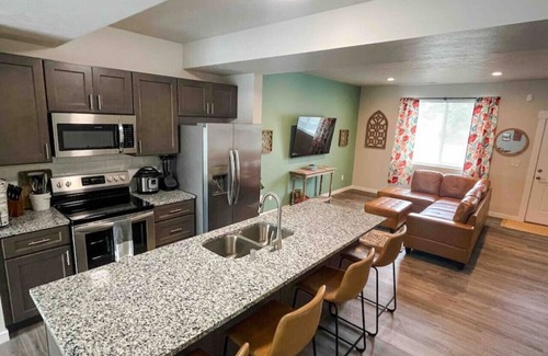 Spokane Apartment | UNIT B · Central 3/2, garage, private yard, walk to arena, EV charger