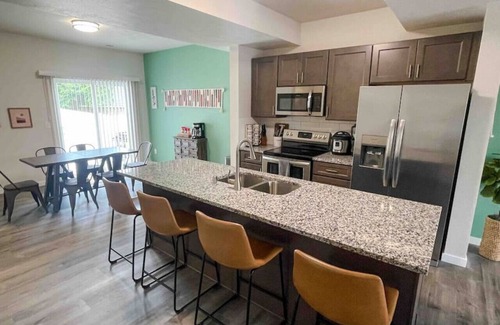 Spokane Apartment | UNIT B · Central 3/2, garage, private yard, walk to arena, EV charger