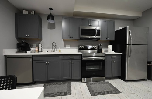 Mancelona Condo | Unpack and relax with a Mountain view. New! Sleeps 6 Pools, New construction.