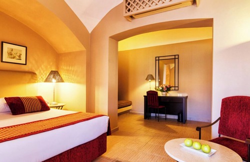 Makadi Bay Resort | Unwind in a Comfortable Room with Pool and Easy Beach Access Nearby