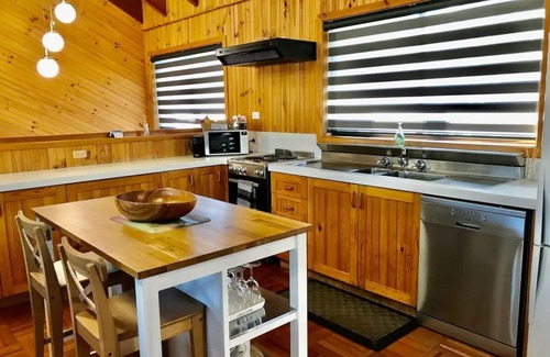 Tuross Head House | Unwind in a stylish 3 bedroom home. Within an easy stroll to beach park & shops.