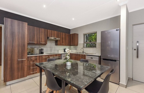 Sandown Apartment | Unwind in Luxury:2BR in Sandton w/Private Balcony