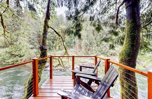 Marmot Apartment | Unwind in nature's embrace at a 1925 cabin with hot tub & river views