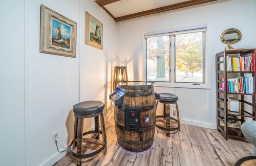 South Haven Cottage | Unwind in Riverfront Comfort — Hot Tub, Fire Pit, Boat Slip, Kayaks