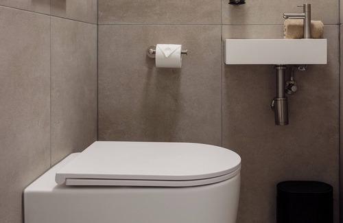 Centrum Apartment | Unwind in this refined suite, blending modern comfort with historic charm.