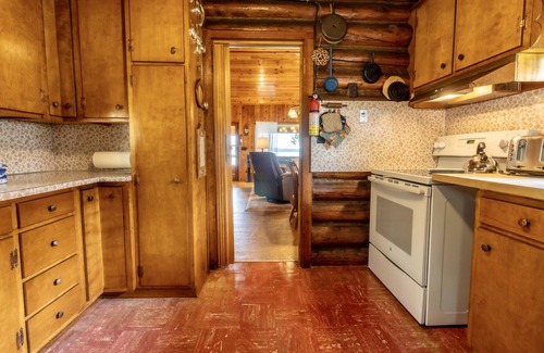 Cedar Cabin | Up North Log Cottage at Memo's Treasure With Private Lake Leelanau Waterfront