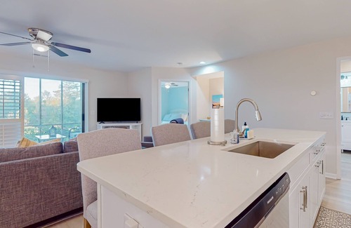 Sea Trail Condo | Updated condos in a great location with sunroom & two kitchens - dog-friendly